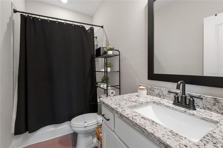Furnished interior view inside a new home in Reunion Village, Kissimmee (Image 40).