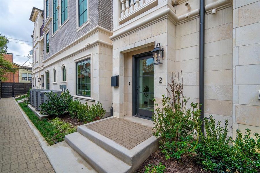 Property entrance with central AC unit