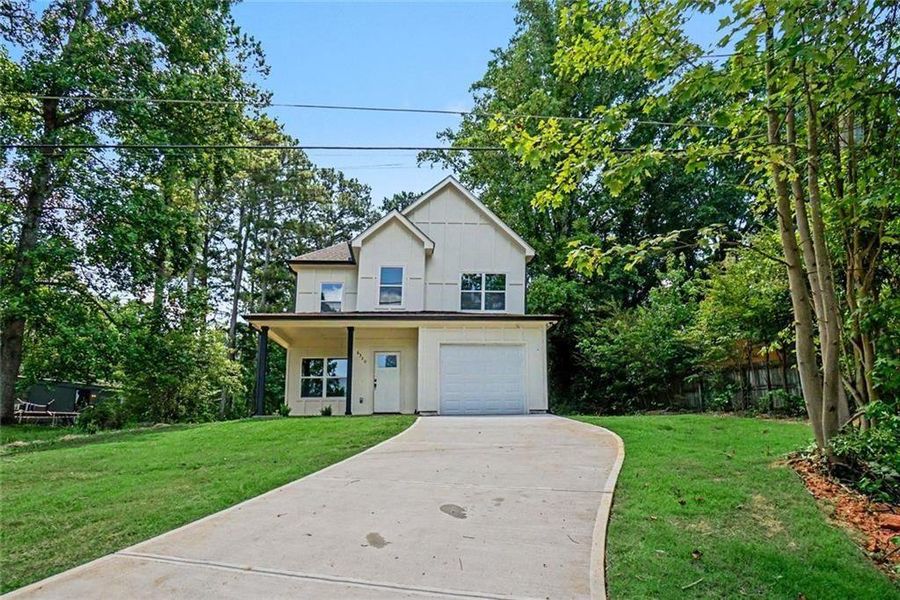 Front exterior of a new home in , Gainesville, GA, highlighting curb appeal (Image 17).