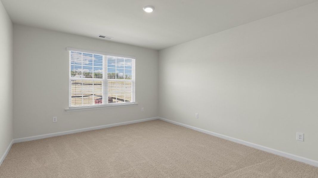 Spacious, unfurnished interior of a new home in The Reserve at Stoney Creek, Whitsett (Image 28).