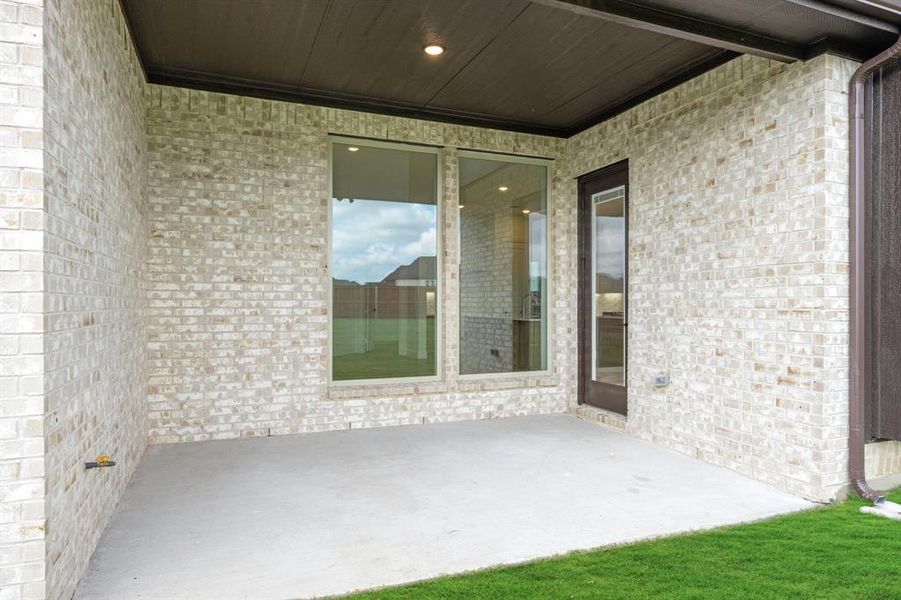 Exterior details and patio area of a home in Mosaic, Celina (Image 4). Exterior details and patio area of a home in Mosaic, Celina (Image 4).