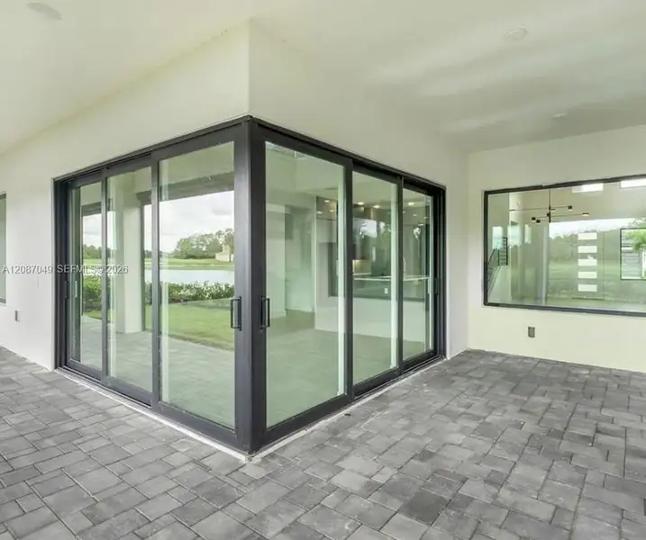 Exterior details and patio area of a home in , Davenport (Image 3).