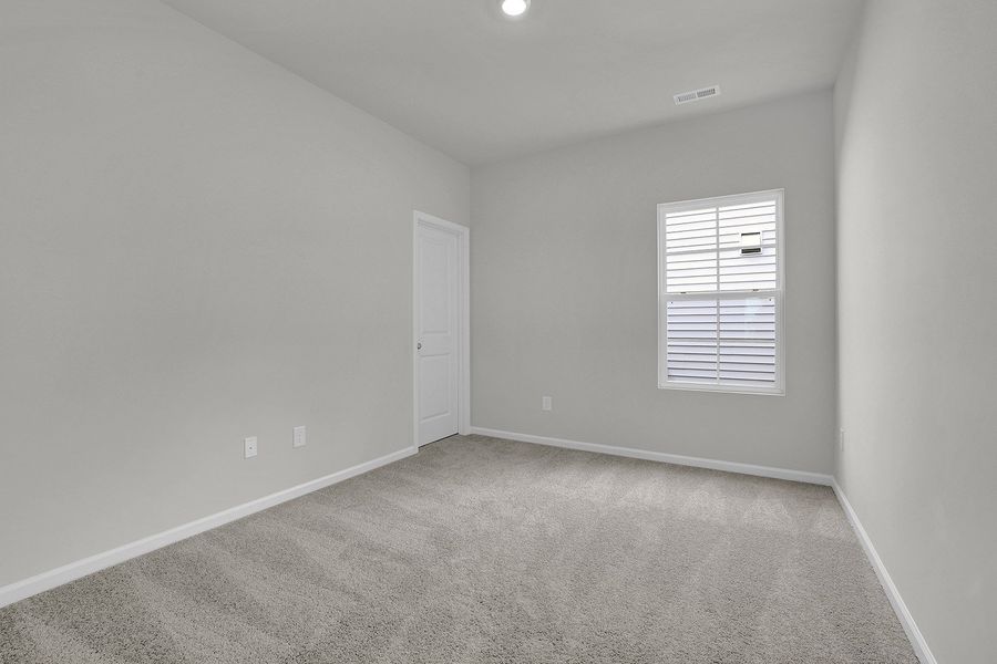 Spacious, unfurnished interior of a new home in River Tide Farms, Bolivia (Image 23).