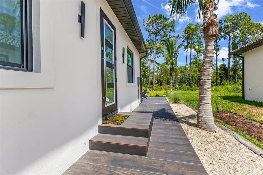 Exterior details and patio area of a home in , North Port (Image 23).