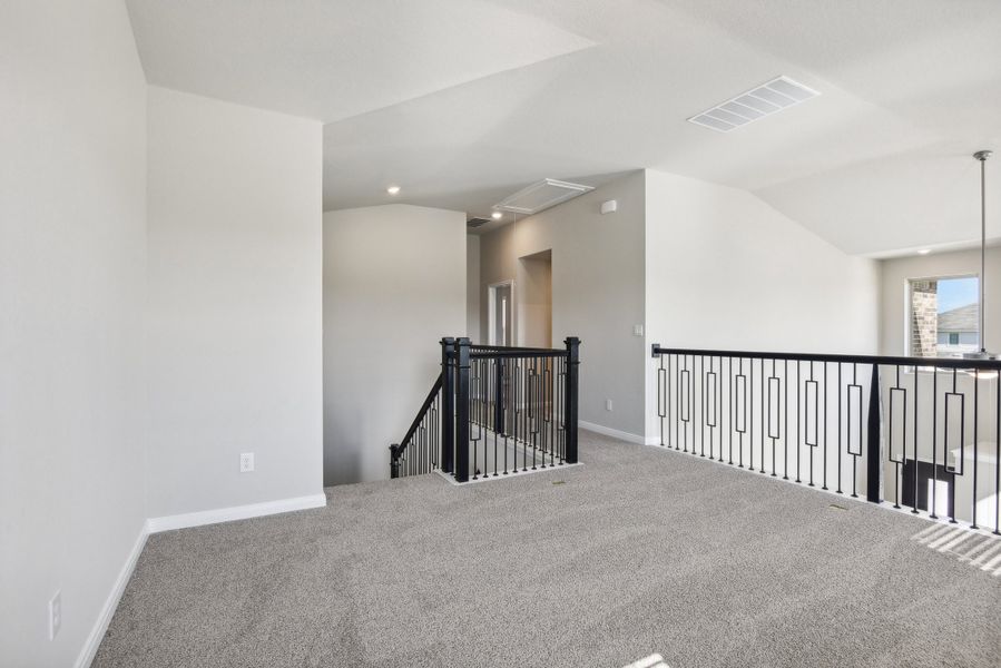 Second floor landing in the Medina floorplan at a Meritage Homes community.