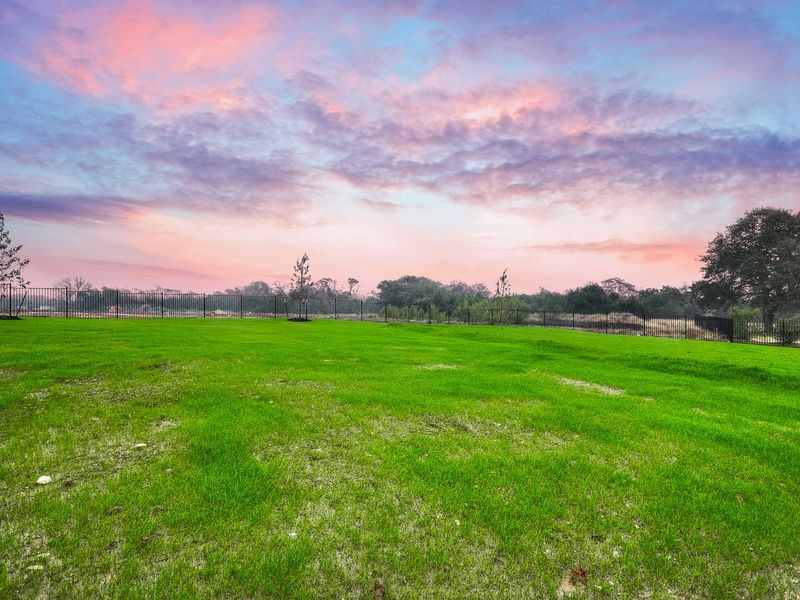 Outdoor and nature views near homes built from the Madera II by Giddens Homes in Scofield Farms Estates, Georgetown (Image 457).