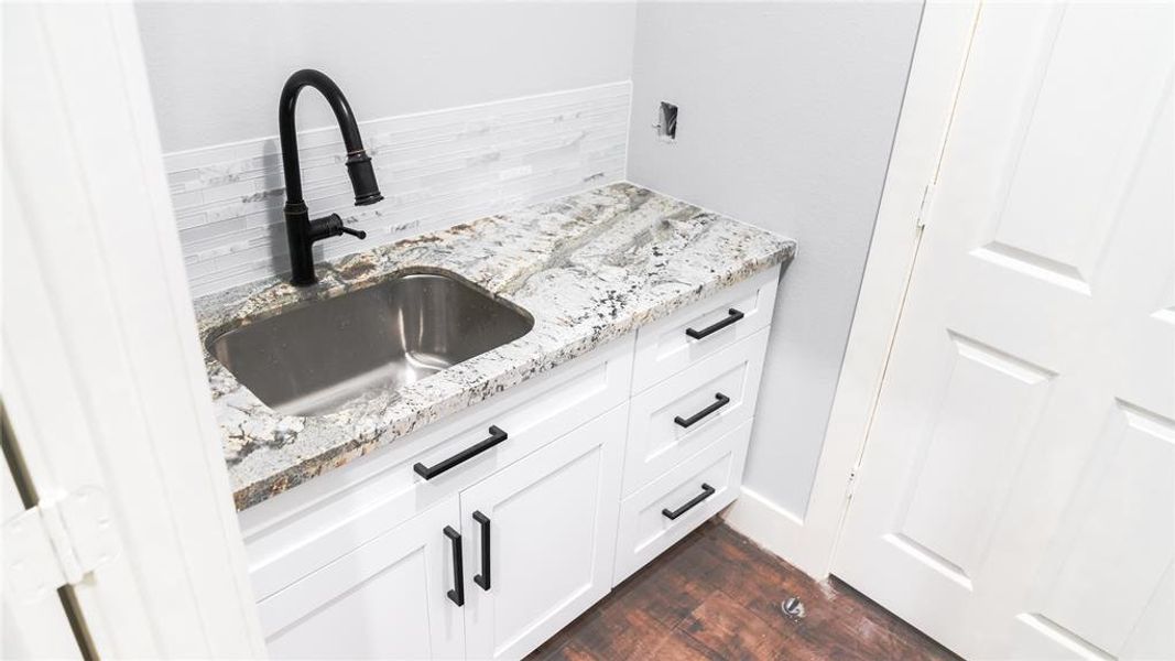 Laundry Room, with cabinets, and a sink.