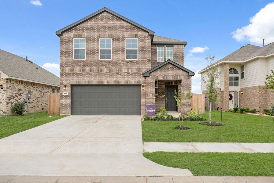 Front exterior of a new home in Riverwood Ranch, Angleton, TX, highlighting curb appeal (Image 15). Front exterior of a new home in Riverwood Ranch, Angleton, TX, highlighting curb appeal (Image 15).