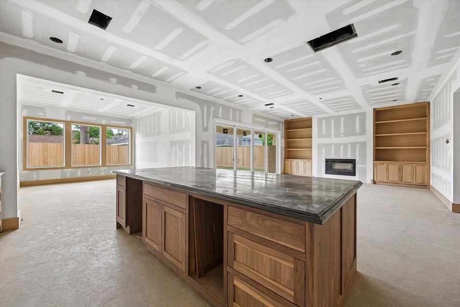 Spacious living and dining areas flow effortlessly to oversized sliding glass doors opening to the covered patio and outdoor kitchen. Recessed lighting and expansive rear windows bring architectural detail and natural light to this Oak Forest new construction. Spacious living and dining areas flow effortlessly to oversized sliding glass doors opening to the covered patio and outdoor kitchen. Recessed lighting and expansive rear windows bring architectural detail and natural light to this Oak Forest new construction.