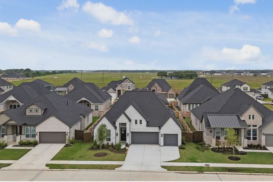 Front exterior of a new home in Attwater 65's, Waller, TX, highlighting curb appeal (Image 25).