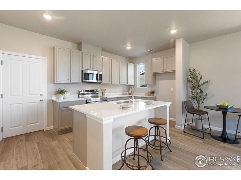 Furnished interior view inside a new home in Spring Valley, Longmont (Image 18). Furnished interior view inside a new home in Spring Valley, Longmont (Image 18).