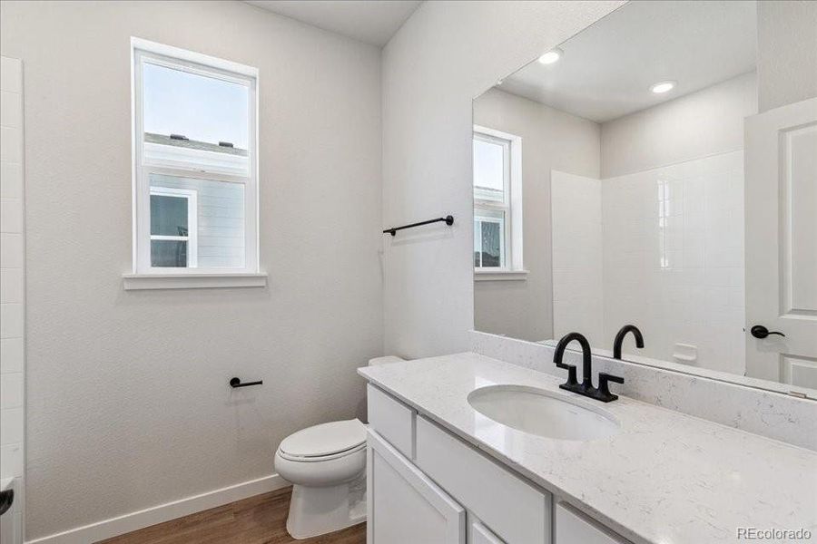 Furnished interior view inside a new home in Paired Homes at Alder Creek, Parker (Image 9).