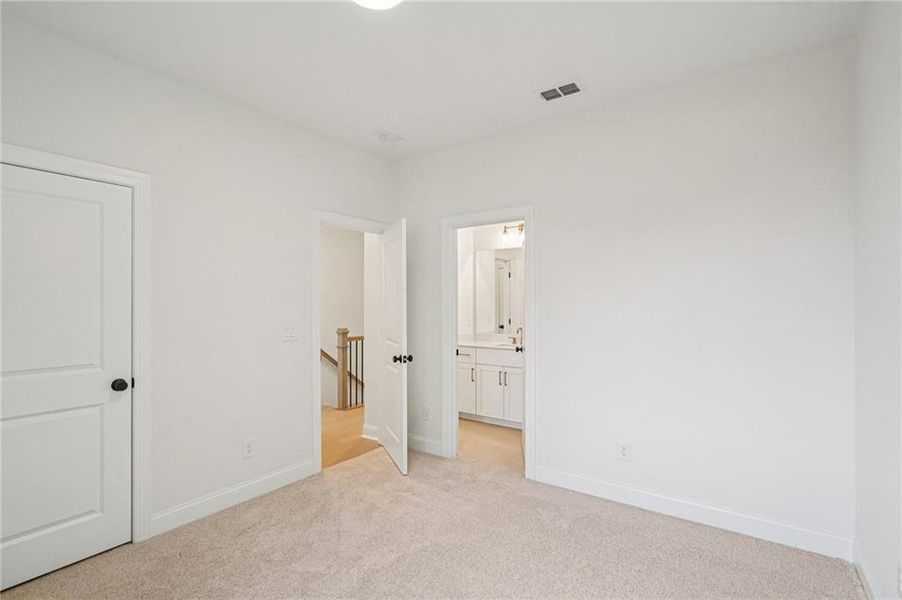 Spacious, unfurnished interior of a new home in Ward's Crossing Townhomes, Johns Creek (Image 18).