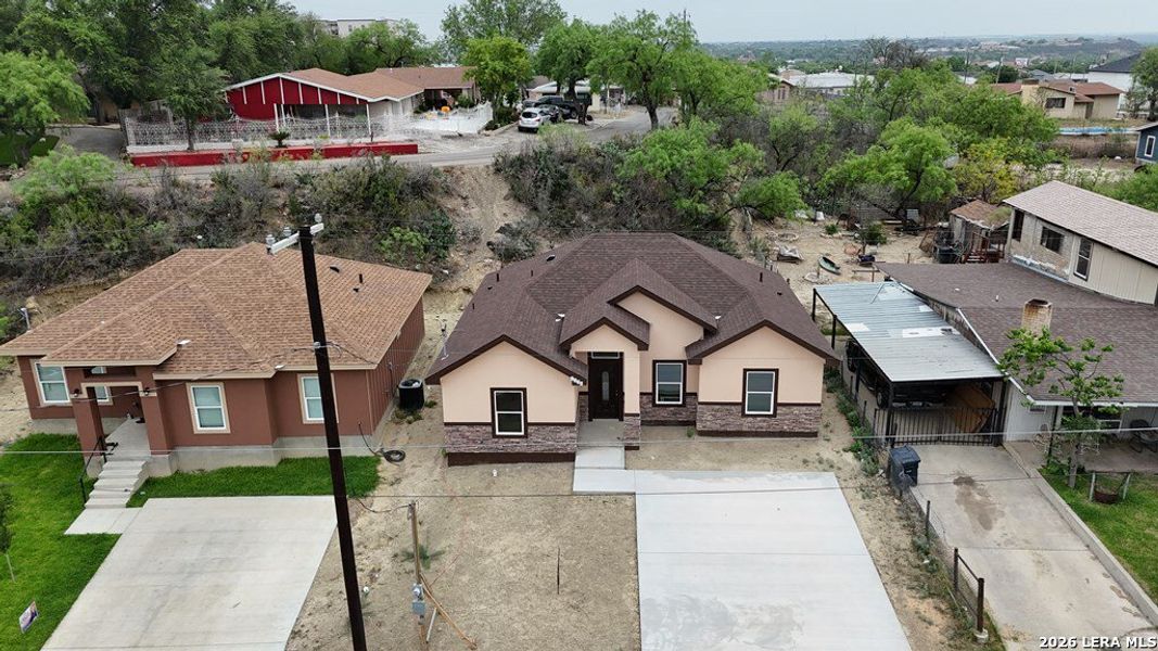 Front exterior of a new home in , Eagle Pass, TX, highlighting curb appeal (Image 2). Front exterior of a new home in , Eagle Pass, TX, highlighting curb appeal (Image 2).
