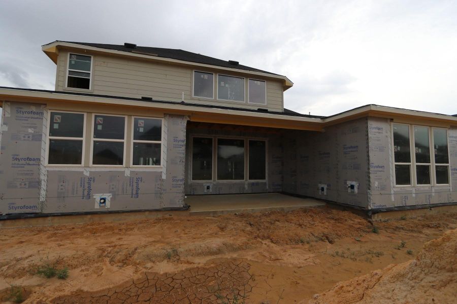 Front exterior of a new home in Dunham Pointe 60′, Cypress, TX, highlighting curb appeal (Image 2). Front exterior of a new home in Dunham Pointe 60′, Cypress, TX, highlighting curb appeal (Image 2).