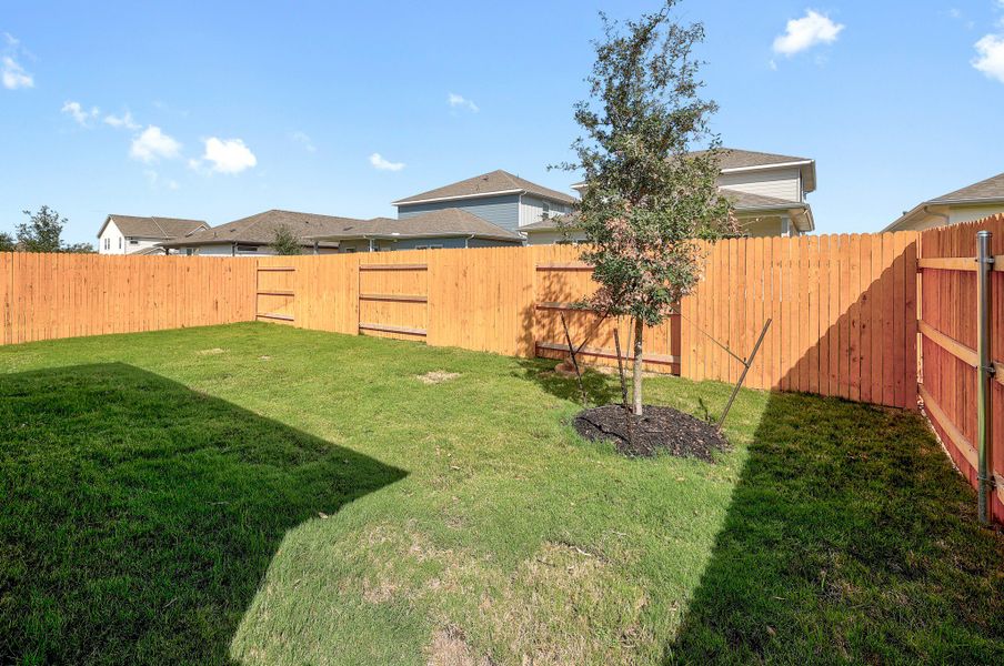 Exterior details and patio area of a home in Prairie Winds, Hutto (Image 20).