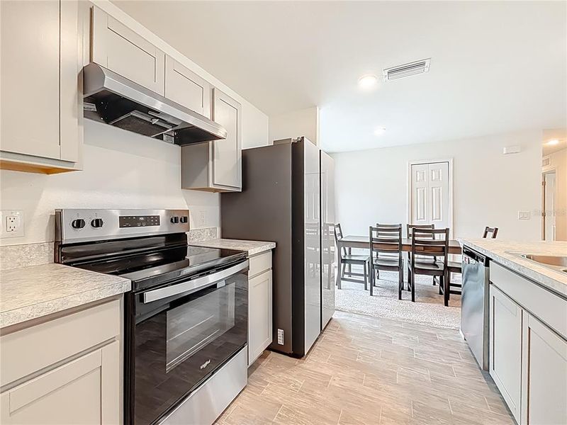 Furnished interior view inside a new home in , Port Charlotte (Image 4).
