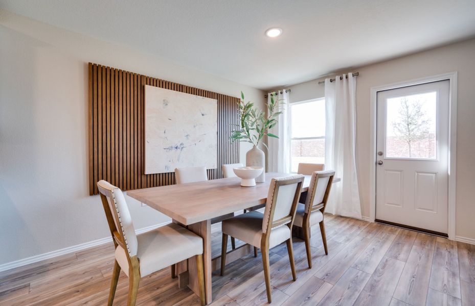 Representative furnished interior of a home built from the Stockdale by Centex in Mobberly Farms, Pilot Point (Image 7).