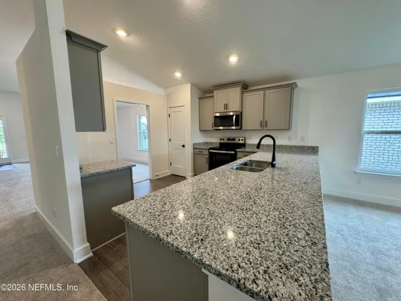Furnished interior view inside a new home in Shadow Crest at Rolling Hills, Green Cove Springs (Image 6).