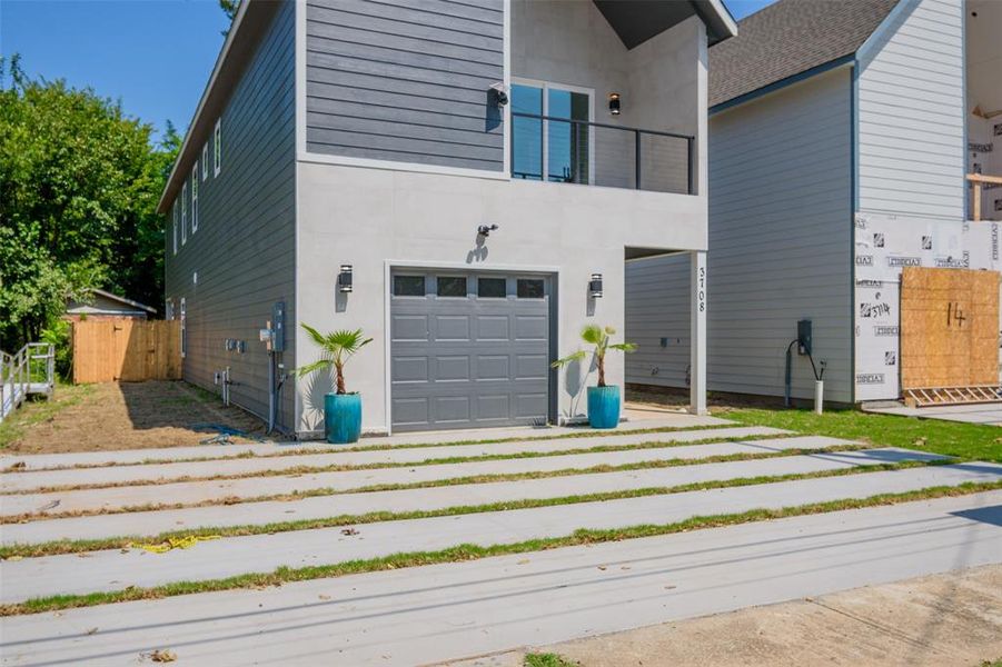 Front exterior of a new home in , Dallas, TX, highlighting curb appeal (Image 26).
