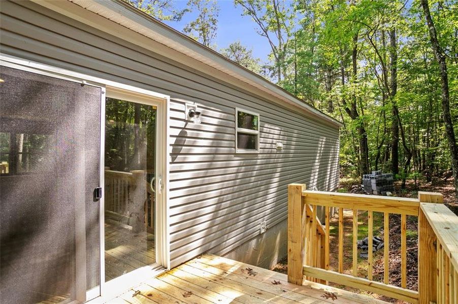 Exterior details and patio area of a home in , Ellijay (Image 16).