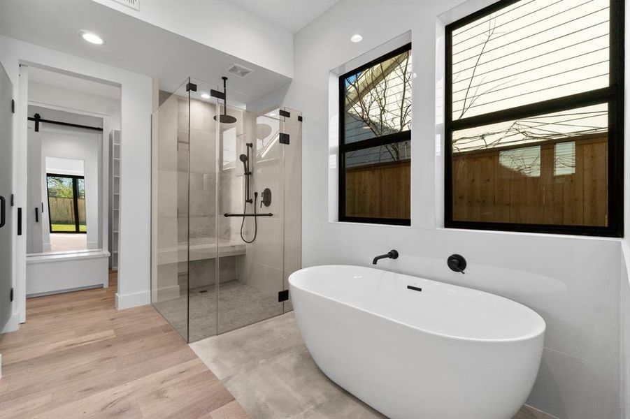 This is the view of the shower and freestanding tub.