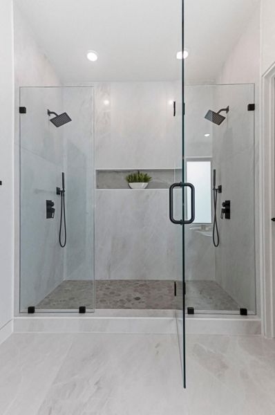 Full bath with a stall shower and recessed lighting