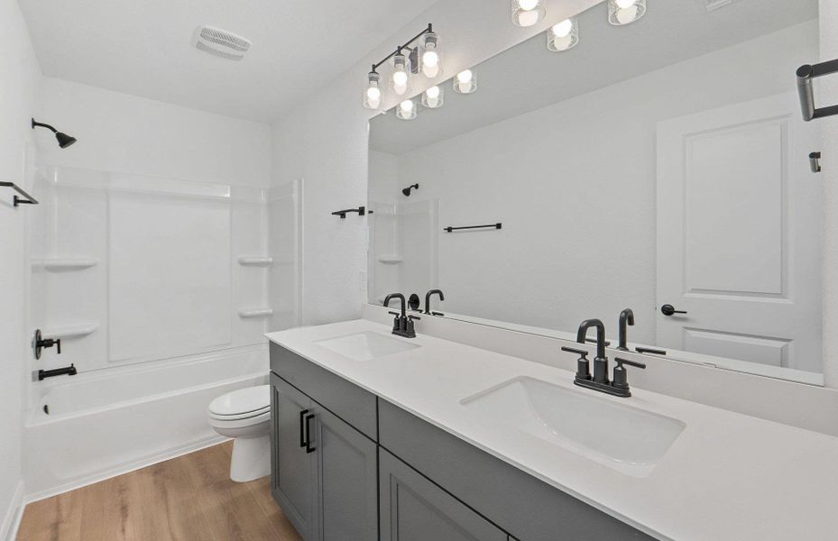 Furnished interior view inside a new home in Saddleback at Santa Rita Ranch, Liberty Hill (Image 5). Furnished interior view inside a new home in Saddleback at Santa Rita Ranch, Liberty Hill (Image 5).