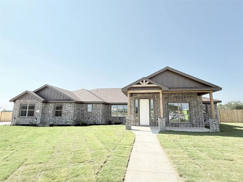 Front exterior of a new home in , Copperas Cove, TX, highlighting curb appeal (Image 13).