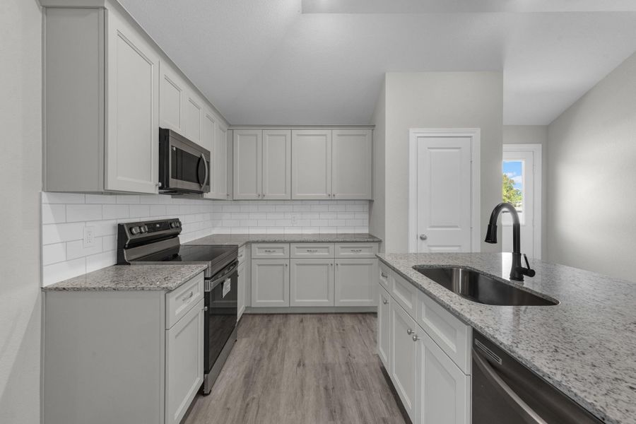 Furnished interior view inside a new home in The Enclave at Spring Branch, Conroe (Image 11).