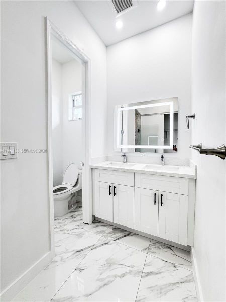 Furnished interior view inside a new home in , Port St. Lucie (Image 11).