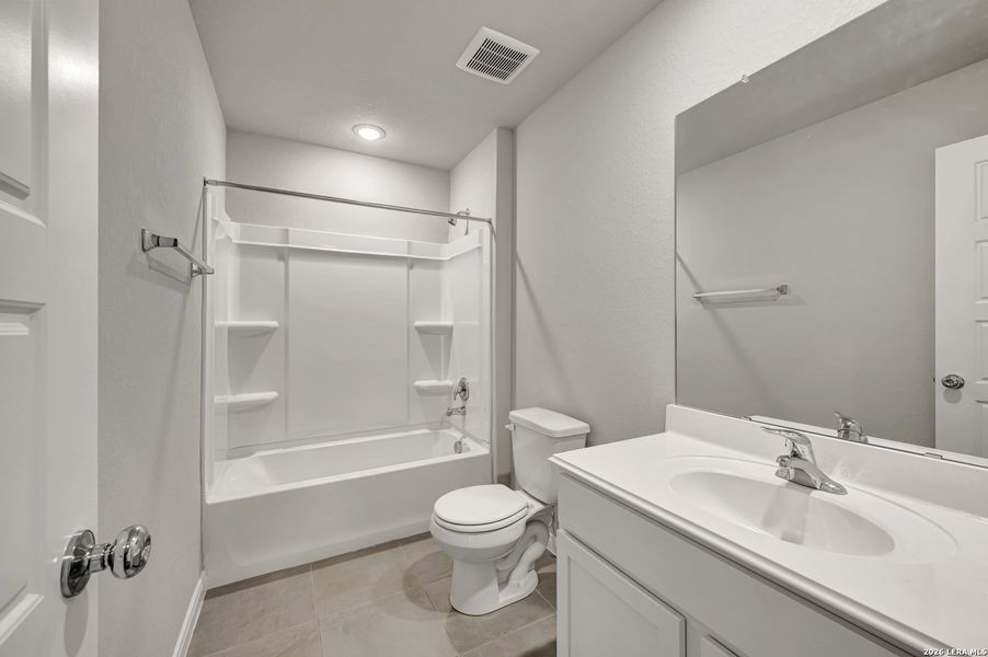 Furnished interior view inside a new home in Greenspoint Heights, Seguin (Image 5).