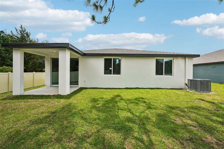 Exterior details and patio area of a home in Pine Ridge Meadows, Hudson (Image 27).