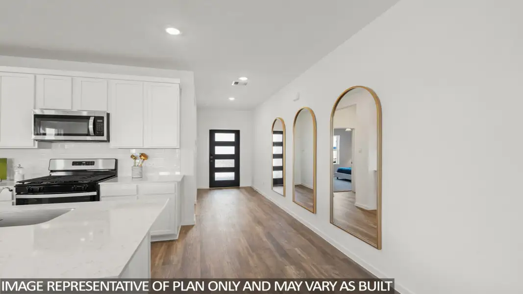 Furnished interior view inside a new home in Sunterra Lakes, Brookshire (Image 7).