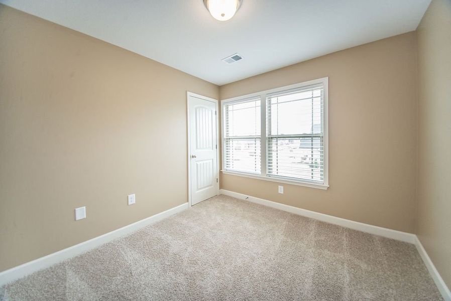 Representative unfurnished interior of a home built from the Reynolds by Enchanted Homes in Arcadia Village, Spartanburg (Image 43).