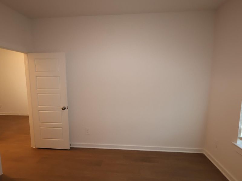 Spacious, unfurnished interior of a new home in Pinewood at Grand Texas, New Caney (Image 22).