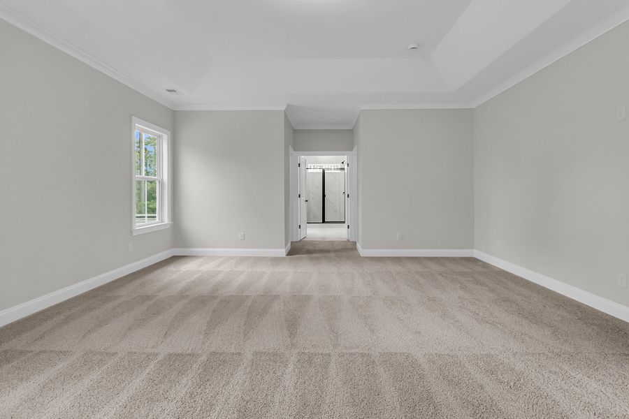 Spacious, unfurnished interior of a new home in Tidewater at Lakes of Cane Bay, Summerville (Image 52).