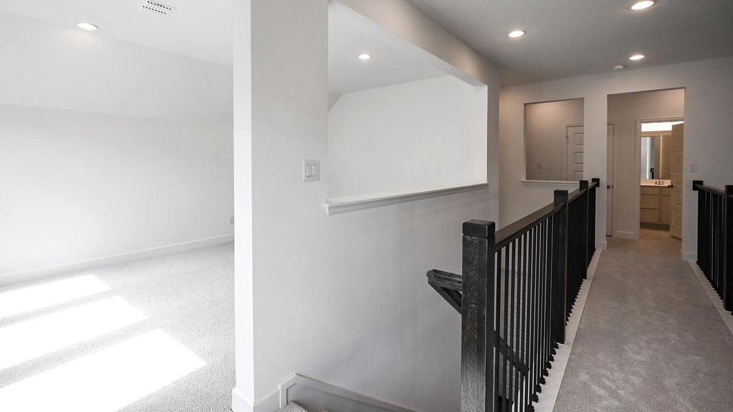 Spacious, unfurnished interior of a new home in 6 Creeks, Kyle (Image 13).