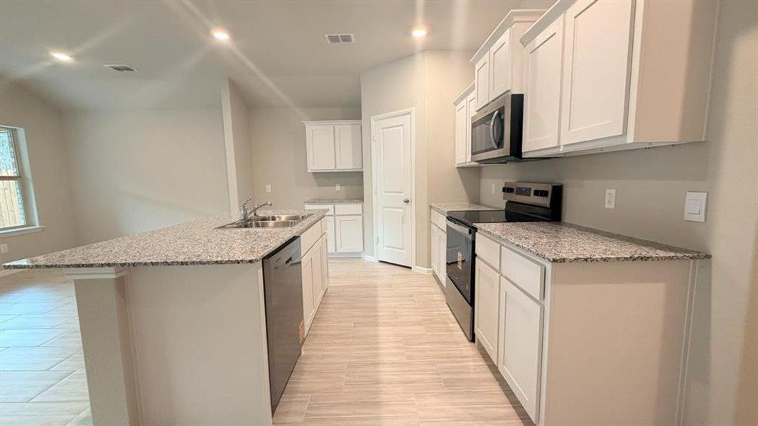 Kitchen - All Home and community information, including pricing, included features, terms, availability and amenities, are subject to change at any time without notice or obligation. All Drawings, pictures, photographs, video, square footages, floor plans, elevations, features, colors and sizes are approximate for illustration purposes only and will vary from the homes as built.