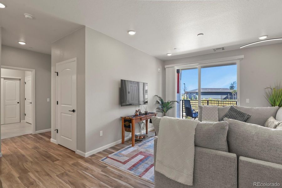 Furnished interior view inside a new home in Stonegate Condos, Parker (Image 12).