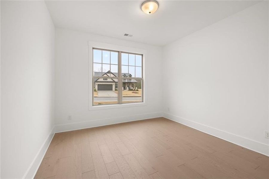 Spacious, unfurnished interior of a new home in Soleil Belmont Park, Canton (Image 43).