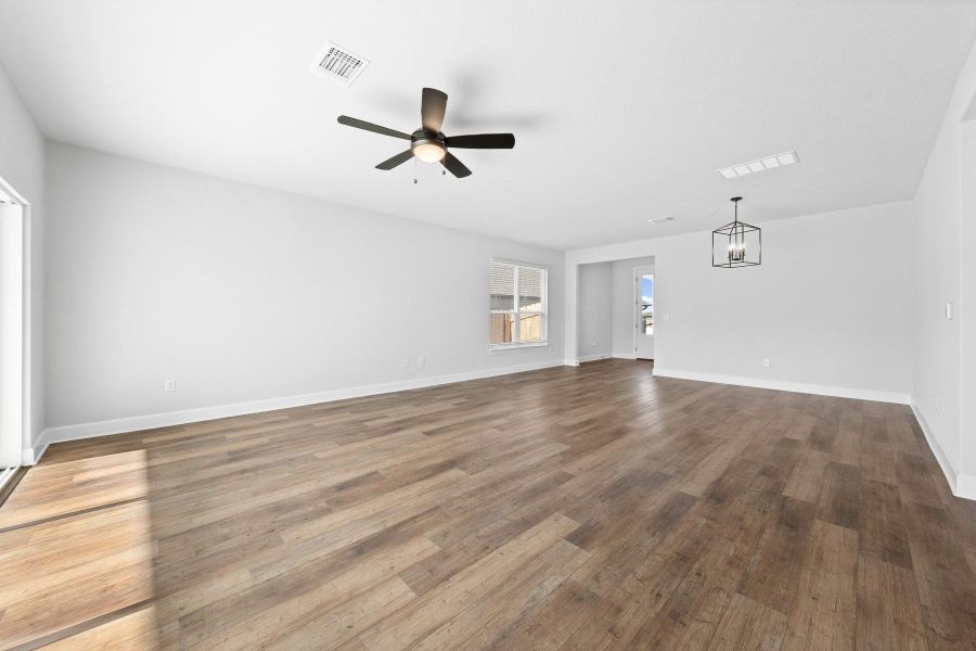 Spacious, unfurnished interior of a new home in Whisper Valley, Manor (Image 9).