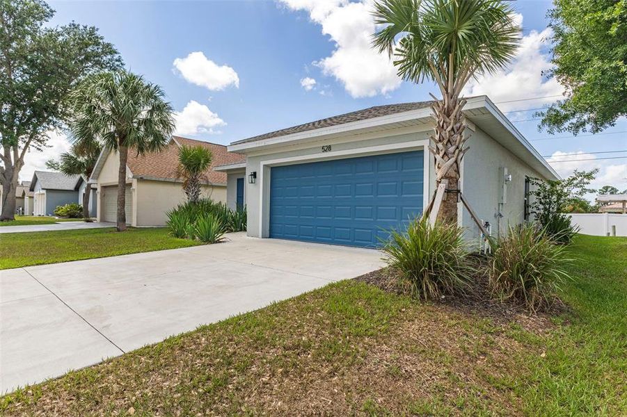 Front exterior of a new home in , Port Charlotte, FL, highlighting curb appeal (Image 25).