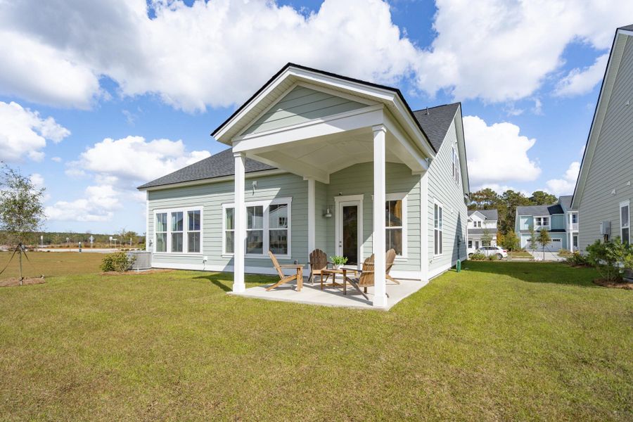 Front exterior of a new home in Limehouse Farms: Arbor Collection, Summerville, SC, highlighting curb appeal (Image 18). Front exterior of a new home in Limehouse Farms: Arbor Collection, Summerville, SC, highlighting curb appeal (Image 18).