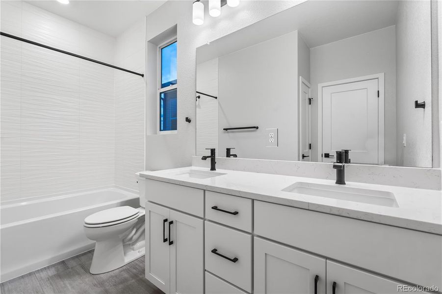 Furnished interior view inside a new home in Tribute at Lyric, Lone Tree (Image 9).