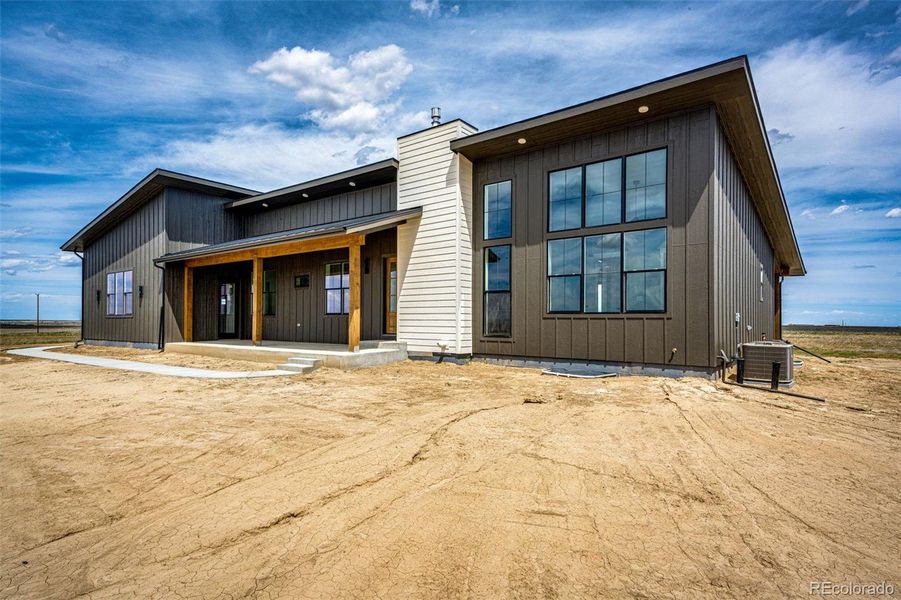 Front exterior of a new home in , Byers, CO, highlighting curb appeal (Image 26). Front exterior of a new home in , Byers, CO, highlighting curb appeal (Image 26).