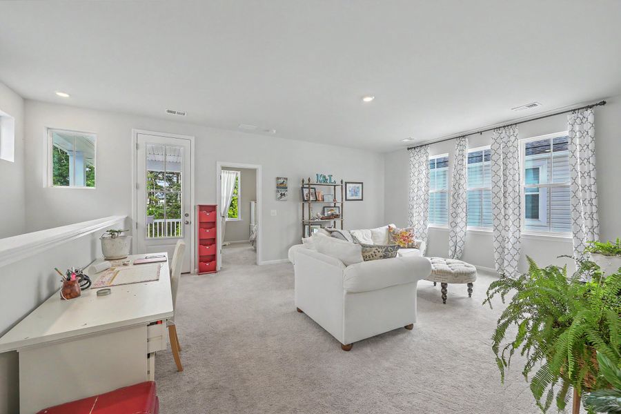 Furnished interior view inside a new home in Limehouse Village: Row Collection, Summerville (Image 37).