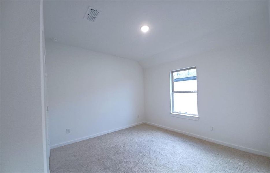 Fourth bedroom upstairs with large closet.