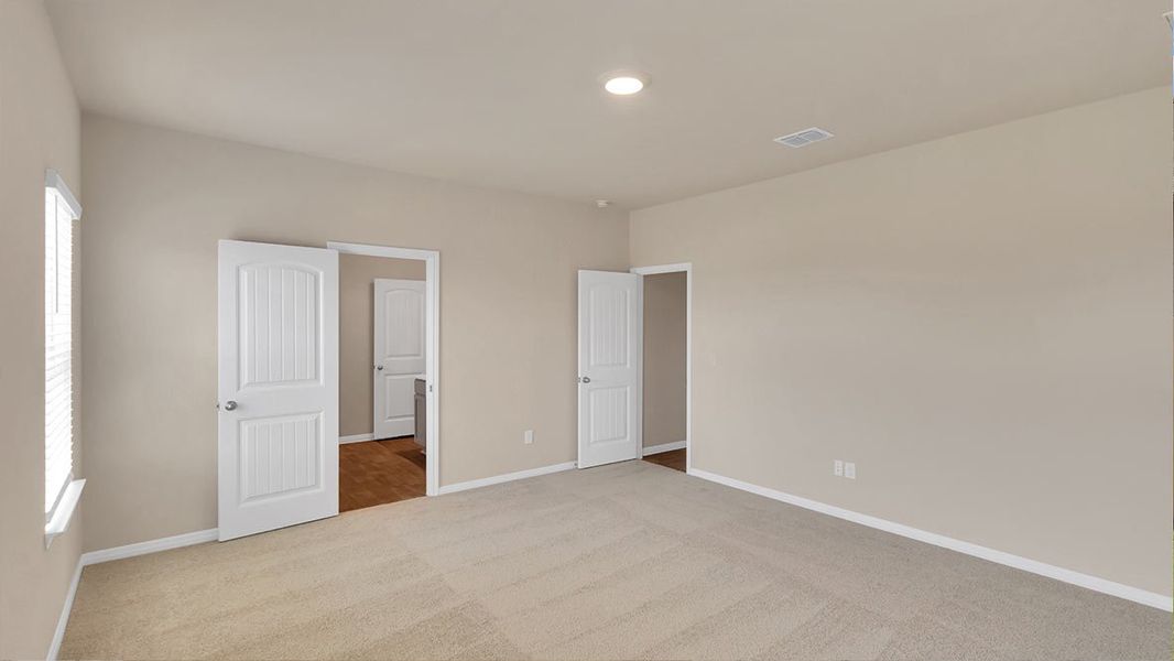 Representative unfurnished interior of a home built from the The Quincy by D.R. Horton in Monarch Ranch, Manor (Image 9).