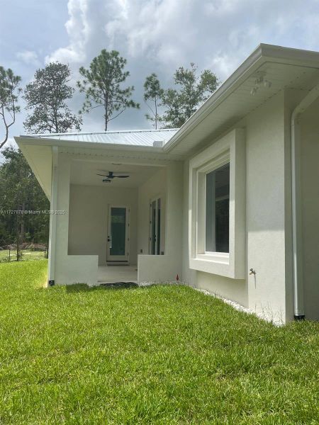 REAR PORCH ENTRANCE - PICTURE WINDOW